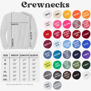 May include: A chart showing the size, width, length, and sleeve measurements in inches for a crewneck sweatshirt. The chart also shows a color palette of 25 different colors for the sweatshirt.