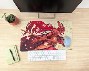 May include: A mouse pad featuring a fantasy illustration of a woman in armor with red hair and wings, holding a sword. The background is a light yellow with white butterflies.