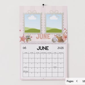 May include: A pink and white striped wall calendar for June 2026. The calendar features two framed images with clouds and green hills, along with decorative starfish, a coconut, and a flower. The word "JUNE" is displayed prominently.