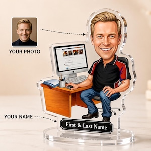 May include: A custom acrylic desk ornament featuring a cartoon-style illustration of a person sitting at a wooden desk with a computer, keyboard, and mouse. The base includes a black rectangular plaque with the text First & Last Name.