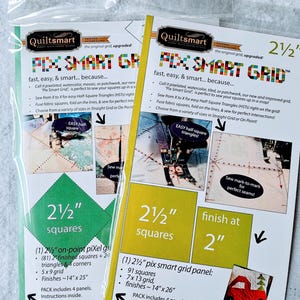 May include: Two yellow and green cards with the text "Pix Smart Grid" and images of quilt blocks. The cards are for 2 1/2 inch squares and include instructions for making quilts. The text on the cards reads "fast, easy, & smart... because..." and "Call it pixelated, watercolor, mosaic, or patchwork, our new "Pix Smart Grid" is perfect to sew your squares up in a snap!"