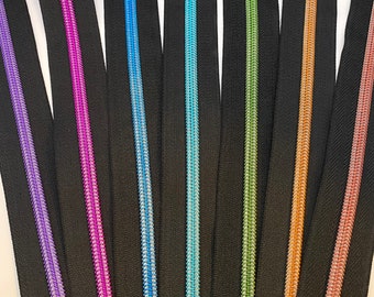 Zipper “Intense Colors”, black, wide / endless zipper with metallized plastic bead / sold by the meter