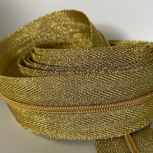 Zipper &quot;Golden Sparkle&quot;, narrow, extra-wide tape / metallized endless zipper with spiral bead / sold by the meter