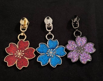 Cerniera “Sparkling Blossom”, stretta/cursore per cerniere strette e continue con perlina/rimorchio/tiretto in plastica