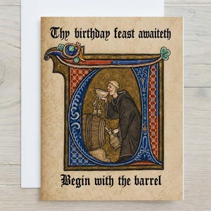 May include: A greeting card featuring a medieval-style illustration of a monk in a dark robe pouring liquid from a wooden barrel into a pitcher. The text reads, Thy birthday feast awaiteth, and, Begin with the barrel, in black gothic font.