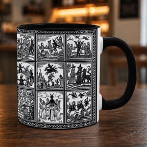 May include: A white ceramic mug with a black handle and interior, featuring a grid of nine black and white illustrations depicting various historical woodcut-style scenes of figures, horned entities, and witches in a variety of ritualistic poses.