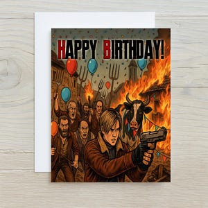 May include: Birthday card with a vibrant illustration. The card displays the words "HAPPY BIRTHDAY!" above a scene of a man with a gun, surrounded by a crowd with pitchforks, a burning building, and a cow.