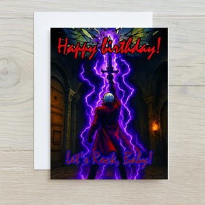 May include: Birthday card with a character in a red coat raising a sword, with purple lightning and the words "Happy birthday!" and "Let's Rock, Baby!" on the front. The card is on a white background.