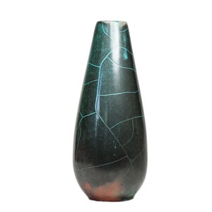May include: A dark green ceramic vase with a crackled glaze and a teardrop shape.