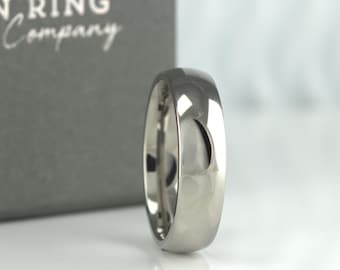 Aliança de casamento em titânio polido: modelo com ajuste confortável, gravação gratuita, disponível em larguras de 2 mm a 10 mm.