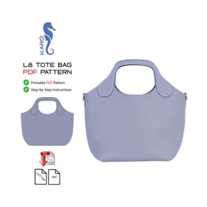 May include: A pale blue tote bag with a matching handle and a smaller outline of the bag. The text "L8 TOTE BAG PDF PATTERN" is displayed, along with "Printable PDF Pattern" and "Step-by-Step Instructions."