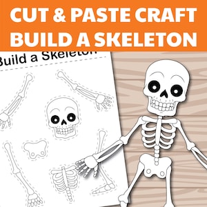 May include: A white and black cut-and-paste craft kit with the text "CUT & PASTE CRAFT BUILD A SKELETON". The kit includes a skeleton outline and separate body parts for assembly. The skeleton is shown assembled.