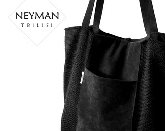 May include: Black tote bag with a suede pocket and the text "NEYMAN TBILISI" on the front.
