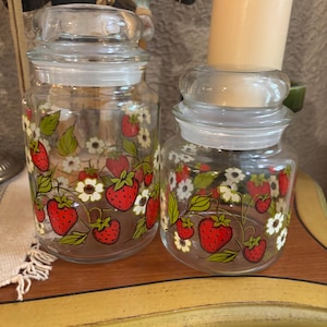 Vintage set of Two (2) Vintage Strawberry white flowers Glass Canisters Jars with lids 5.5in and 7in tall kitchen decor canister sets