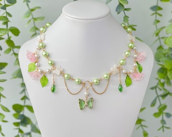 Whimsical Butterfly Necklace, Fairycore Jewelry, Flower Blossom, Green Butterfly, Lily of the Valley, Pink Flowers and Leaves, Cottagecore