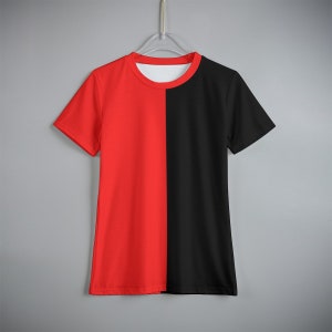 May include: A short-sleeved t-shirt with a vertical split design. One half is red and the other half is black.