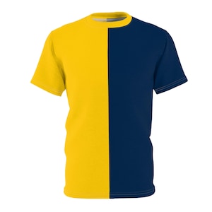Puede incluir: Una camiseta de manga corta con un diseño dividido verticalmente. Una mitad es de color amarillo vibrante y la otra es azul marino oscuro. La camiseta tiene cuello redondo y está hecha de una tela suave.