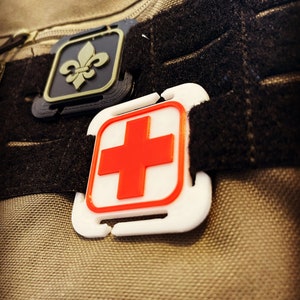 Symbols patch for MOLLE system made of plastic