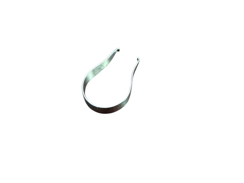 May include: A silver metal ring with a U-shaped design.