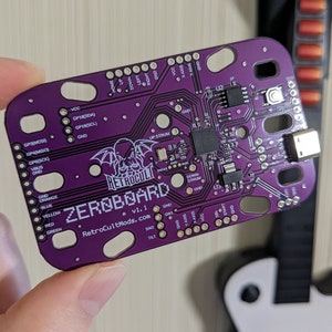 Zeroboard - RP2040 Integrated Strumboard for Guitar Hero Controllers by RetroCultMods, no Pico required!