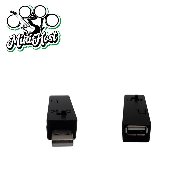 May include: Two black USB adapters with a USB-A port on one end and a USB-C port on the other end.