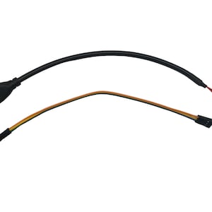 May include: A black HDMI cable with a female connector on one end and a four-wire connector on the other end. The wires are orange, yellow, green, and blue.