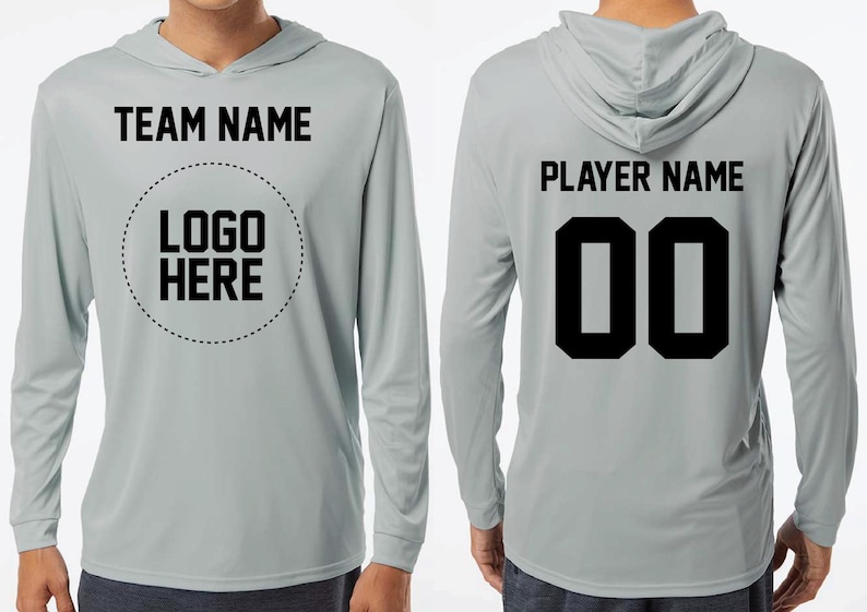 a man wearing a gray hoodie with the name and number on it