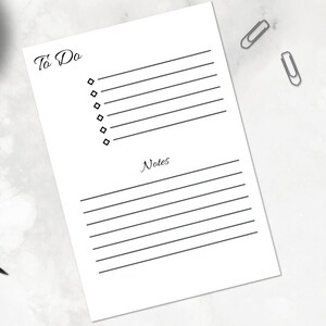 May include: A blank to-do list with a section for notes. The list has a title that says "To Do" and has 10 lines for writing tasks. The notes section has 12 lines for writing.