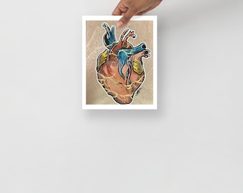 May include: A detailed illustration of a human heart with intricate veins and arteries, rendered in shades of red, yellow, blue, and brown. The heart is surrounded by a gold-colored background.
