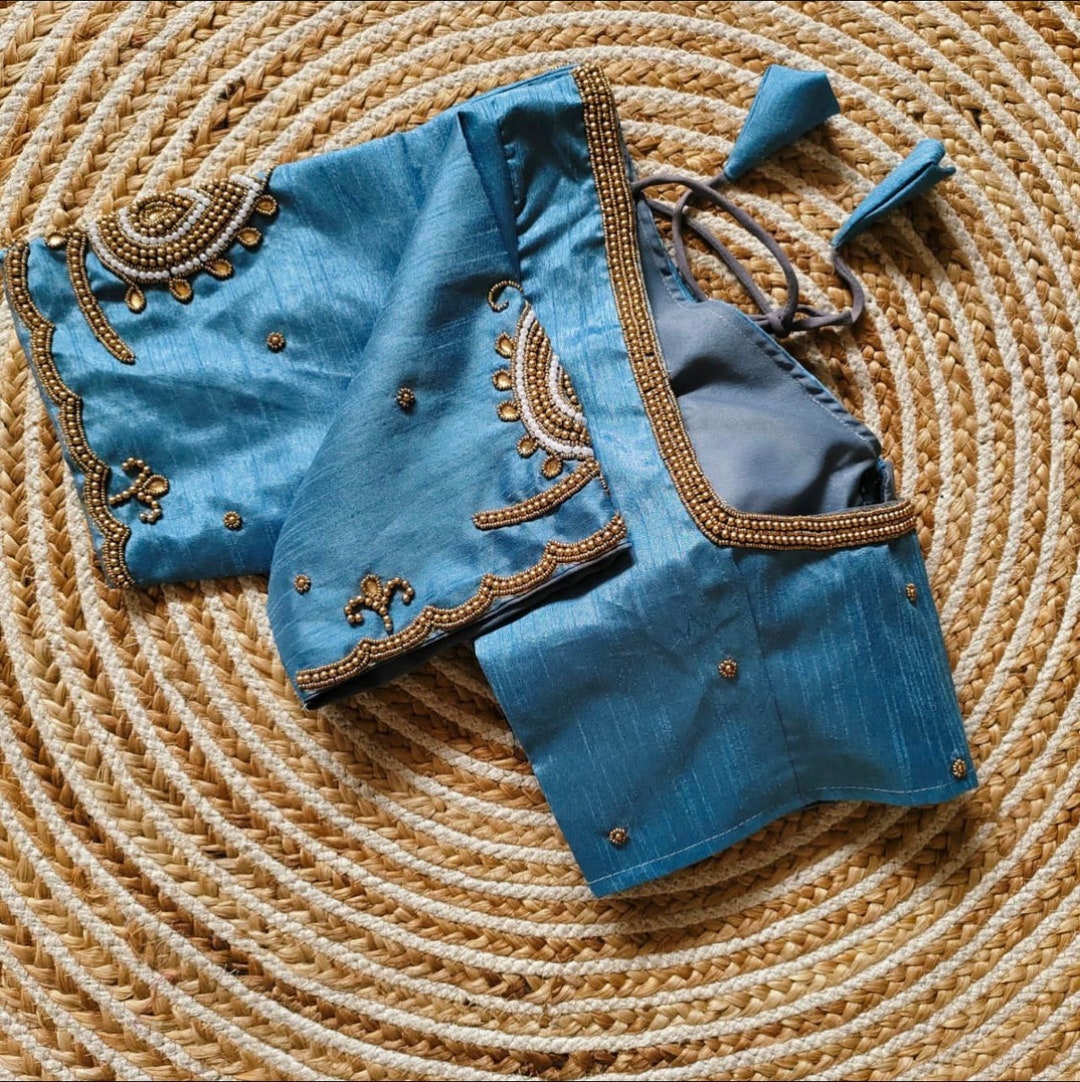 Dusty blue applique work saree with blouse