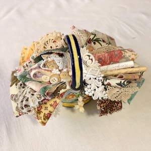 Vintage ceramic basket filled bulk fabric and lace vintage and antique ephemera haberdashery sewing notions junk journal slow stitch gift