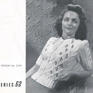 May include: A vintage knitting pattern for a white cable knit sweater with a diamond pattern and embroidered details. The pattern is from Series 62, Design No. 2729.