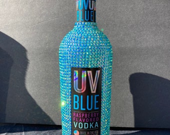 UV blue vodka blinged out bottle