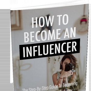 May include: A book cover with the title "How to Become an Influencer" in white text on a black background. The cover features a woman holding a camera and the text "The Step-By-Step Guide To Becoming An Influencer In Your Industry". The cover also includes three checkmarks with the text "Get Recognized", "Build Your Tribe", and "Get Paid For Sponsorships".