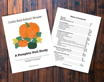 May include: Two white pages with text and illustrations on a wooden surface. One page features a pumpkin illustration and the text "A Pumpkin Unit Study". The other page is a table of contents.