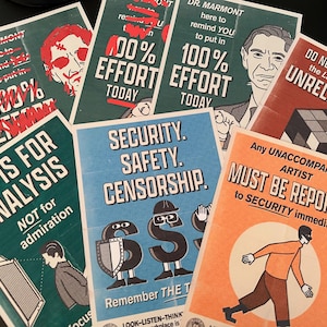 May include: A collection of eight colorful posters with various messages. The posters have a retro, vintage style and feature bold text and illustrations. Some of the messages include "Art is for analysis, not for admiration", "Security. Safety. Censorship", and "Do not contaminate the Lake House with unrelated art".