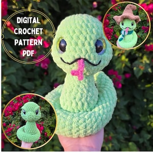 May include: A light green crochet snake with large, glittery eyes and a pink tongue. The snake has a black smile and is shown with two smaller images of the snake, one wearing a hat and scarf. Text in the image reads "DIGITAL CROCHET PATTERN PDF."
