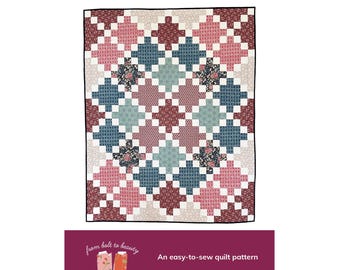 May include: A quilt pattern called "Irish Twist" with a colourful design featuring shades of pink, blue, and white. The pattern is available in four sizes: baby, small throw, large throw, and twin.