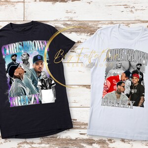 May include: Two t-shirts with a vintage-style graphic of Chris Brown. The graphic features multiple images of Chris Brown in different poses and outfits. The text "Chris Brown" and "Breezy" are printed on the shirts.