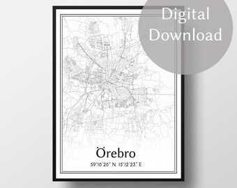 May include: A framed black and white map print of Örebro, Sweden. The map details the city's layout with streets and buildings. The city name and coordinates are printed at the bottom. A digital download label is in the upper right corner.
