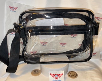 May include: Clear plastic crossbody bag with a black adjustable strap and black zippered compartments. The bag is made of durable, see-through plastic and has a spacious interior.