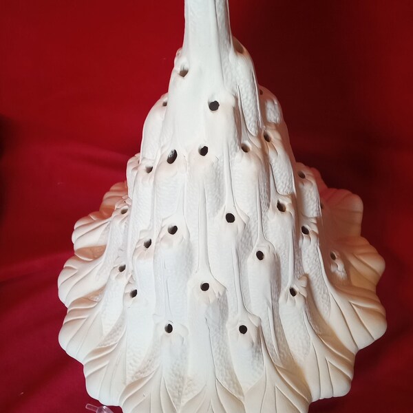 Unpainted bisque ceramic christmas figurines