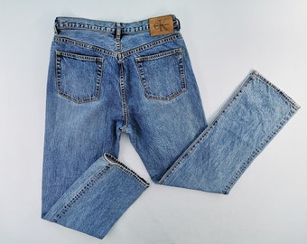 Pantalones vaqueros Calvin Klein desgastados estilo vintage de los 90, talla 34. Pantalones vaqueros Calvin Klein talla 34/35x34.