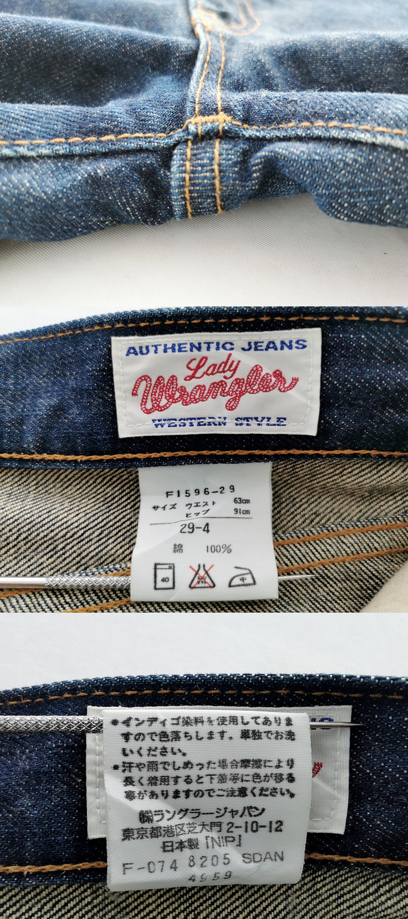 Op de afbeelding: Close-up van een blauwe denim jeans met zichtbare stiksels en labels. De labels luiden "AUTHENTIC JEANS Lady Wrangler WESTERN STYLE" en bevatten maat- en wasvoorschriften. De jeans is gemaakt van 100% katoen.