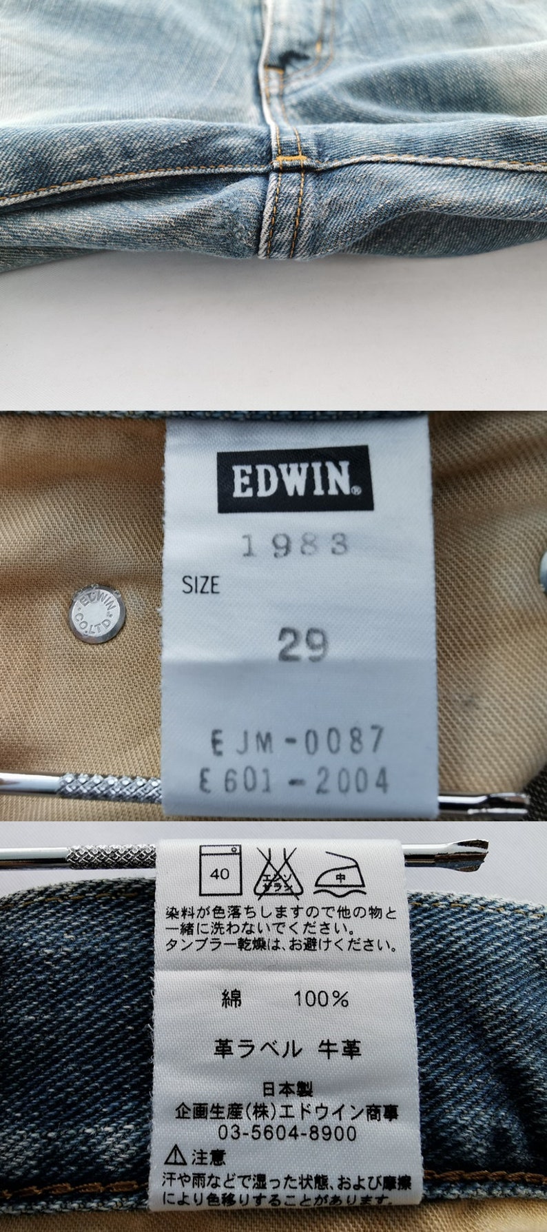 May include: Close-up of light blue denim jeans with a visible label. The label reads "EDWIN 1983" and "SIZE 29". The jeans are made of 100% cotton and have a leather label. The jeans are made in Japan.