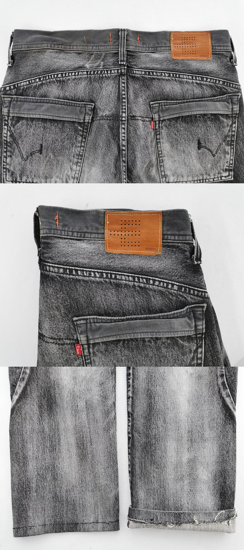May include: Close-up of gray denim jeans with a faded wash. Features include back pockets, a leather patch with the brand name, and orange stitching details. The jeans are folded, showcasing the back and part of the legs.