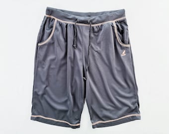 Pantalones Kangol talla LL. Pantalones cortos con logos Kangol talla 26/30x10.