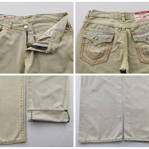 May include: A set of three ceramic mugs with a speckled, matte finish. The mugs are in shades of cream, light brown, and dark brown. Each mug has a simple, minimalist design, perfect for coffee or tea.