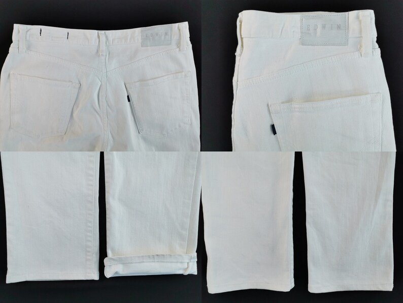 May include: White denim jeans with a classic five-pocket design. The jeans have a straight leg cut and a leather patch with the brand name. The jeans are shown from multiple angles, including the back pockets and the folded hem.