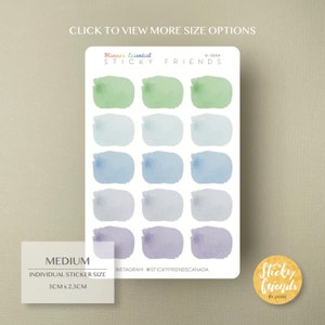 May include: A sheet of 18 watercolor-style round stickers in shades of green, blue, and purple. The stickers are 3 inches by 2.3 inches and are labeled "Planner Essential Sticky Friends".